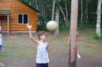 Girl Hitting Ball