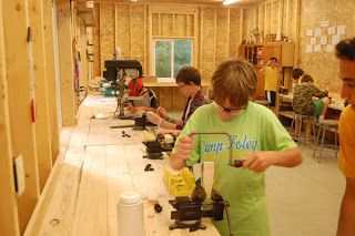 Kids Working In Shop