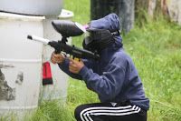 Boy playing PAINTBALL