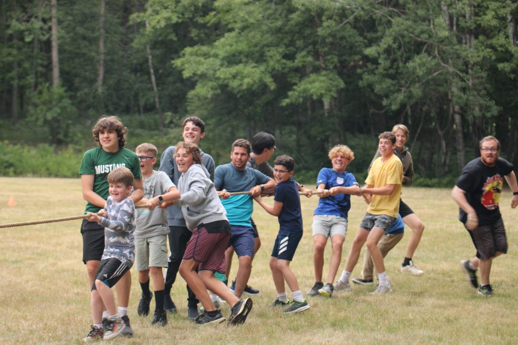 Campers playing a group game and interacting with each other